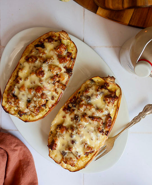 Stuffed Squash with Sausage, Apples, and Cranberries