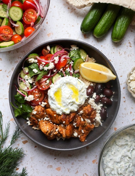 2-in-1 Recipe: Greek-Style Marinated Chicken Rice Bowls and Chicken Pitas with Tzatziki and Tomato-Cucumber Salad