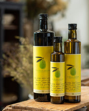 La Belle Excuse Extra Virgin Green Olive Oil, made with Greek olives—available in 250 ml, 500 ml, and 1 L formats.